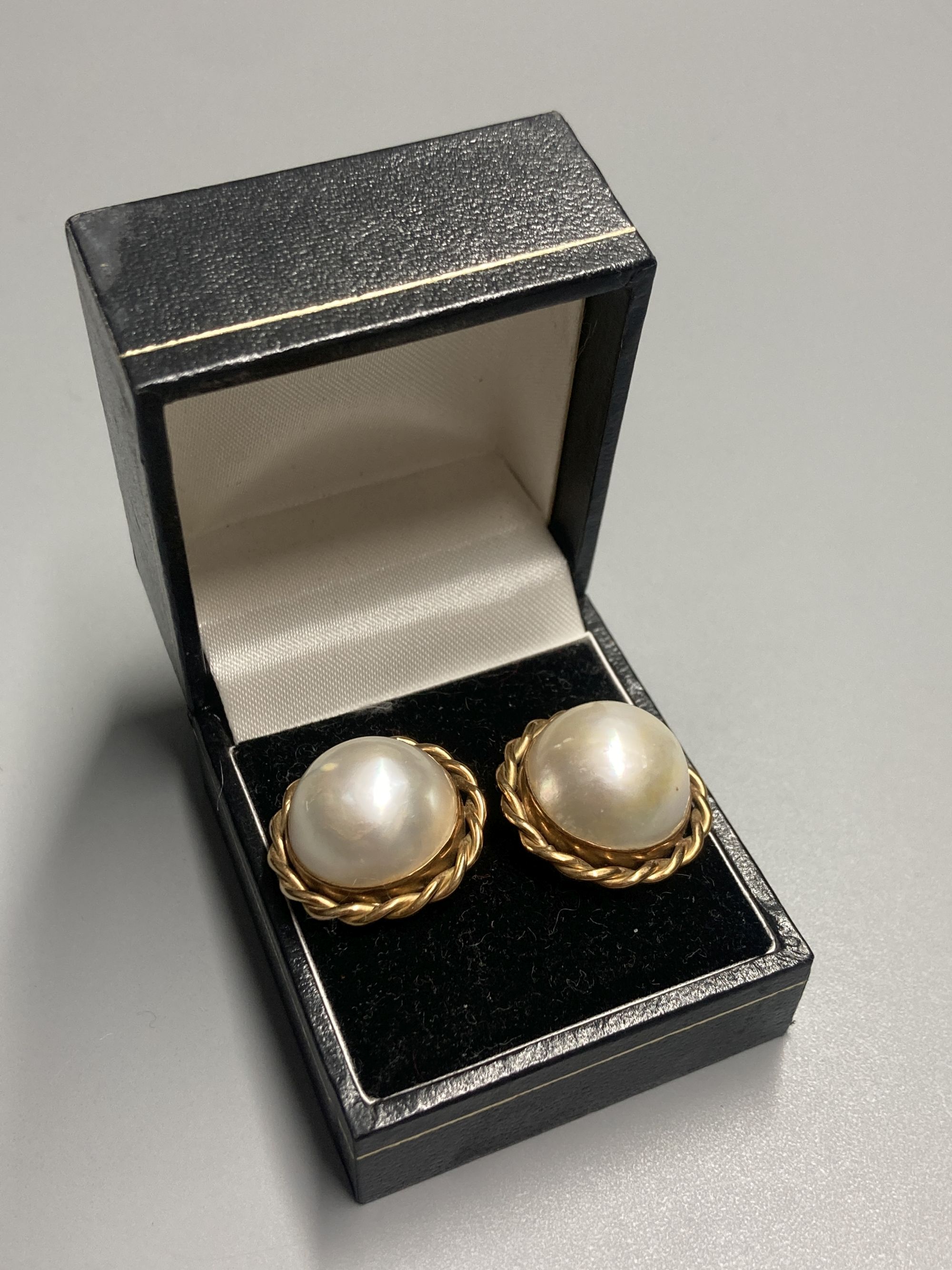 A pair of 20th century yellow metal and mabe pearl earrings, 21mm, one butterfly missing,